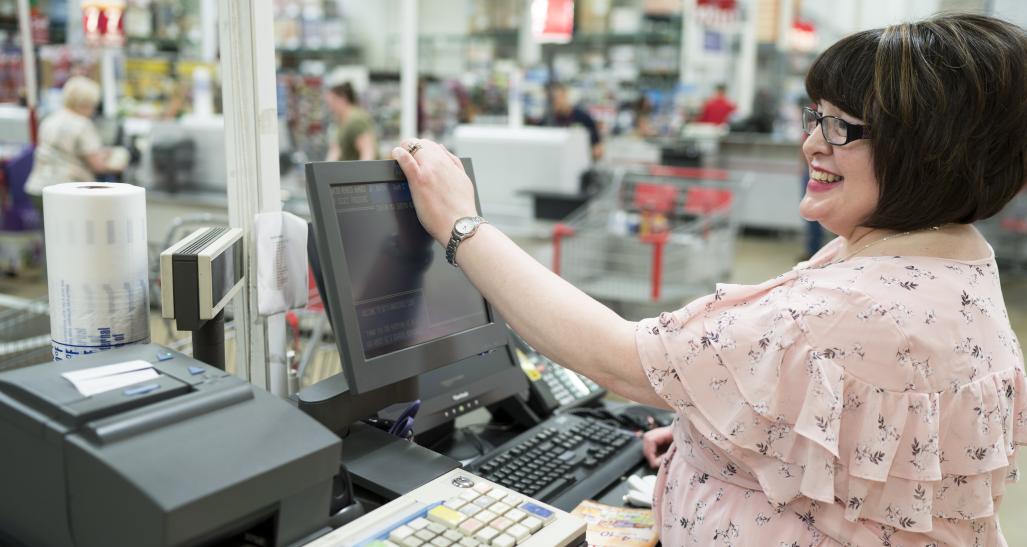 Warehouse employee at register